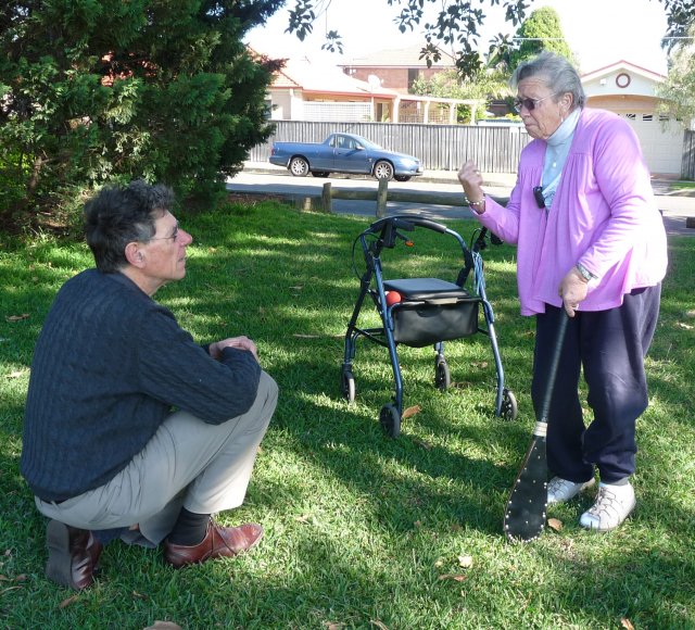 Margaret Slowgrove explains to Peter Read rules of Vigoro (ladies cricket) - a game popular with many local Aboriginal women